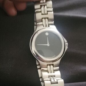 Movado Silver Case Black Dial Bracelet Watch
